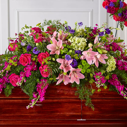 Radiant Tribute Casket Spray – 175 MERCANTILE FLORAL & GIFT, Lake City IA